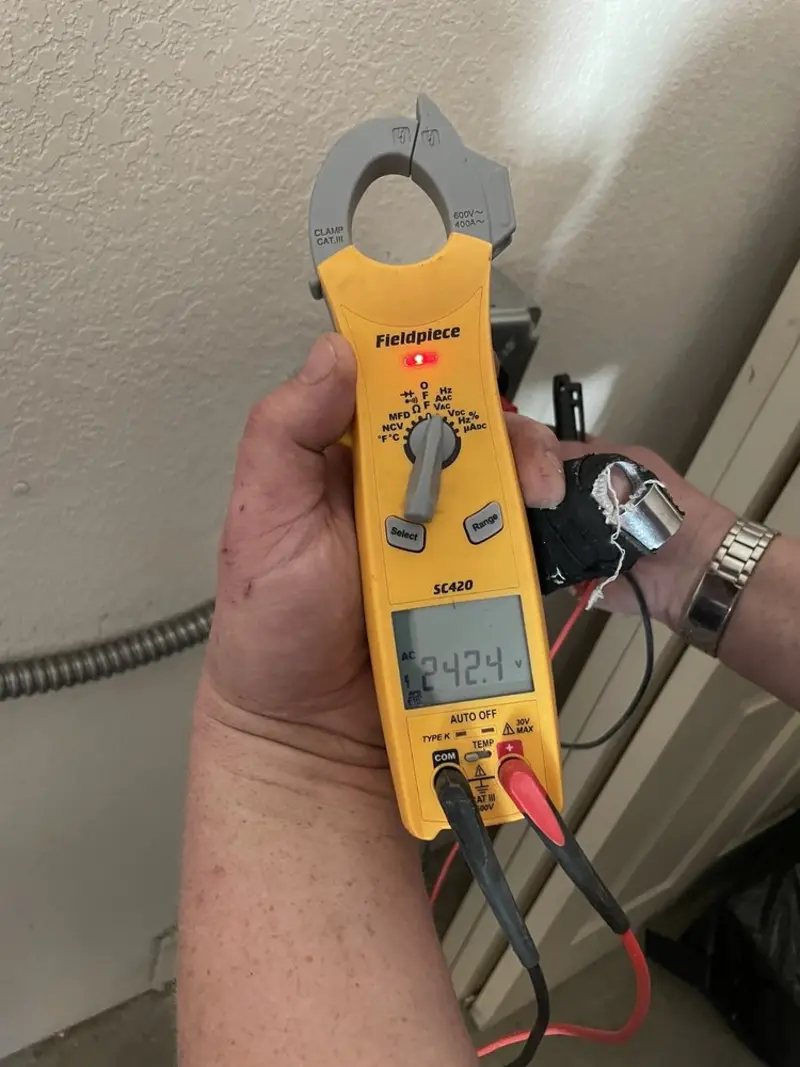 Voltage testing with clamp meter during Circuit Breaker Repair in Saluda